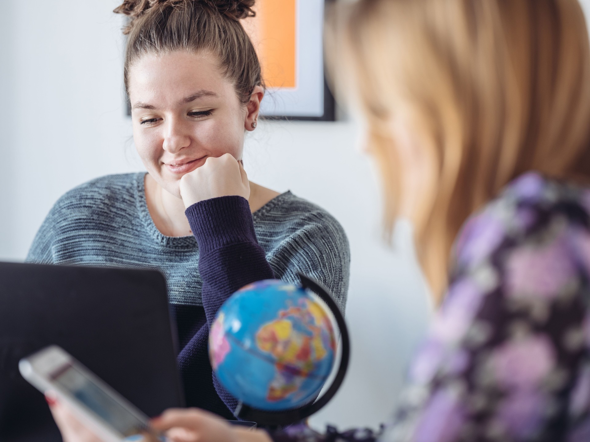 Young women doing homework